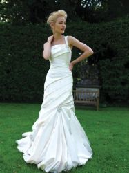 Trumpet/Mermaid Ivory Satin Ruffles wedding dress